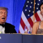 Trump reacts next to CBS News senior White House correspondent and White House Correspondents' Association President (WHCA)
