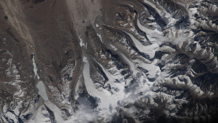 The Mechanics and Formation of Glacial Ice