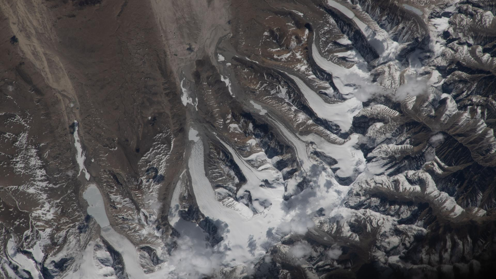 The Mechanics and Formation of Glacial Ice