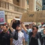 Tate Brothers' Supporters Protest Outside Federal Detention Center Miami