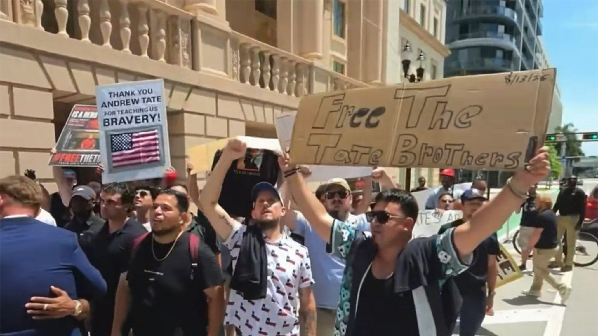 Tate Brothers' Supporters Protest Outside Federal Detention Center Miami