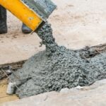 Iron Waste and Magnetized Water Improve Sustainable Concrete Performance