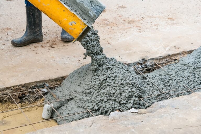 Iron Waste and Magnetized Water Improve Sustainable Concrete Performance