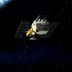 An illustration of a space telescope in orbit above Earth