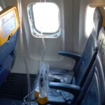 This undated photo provided by the National Transportation Safety Board on Thursday, Aug. 13, 2026, shows the shattered