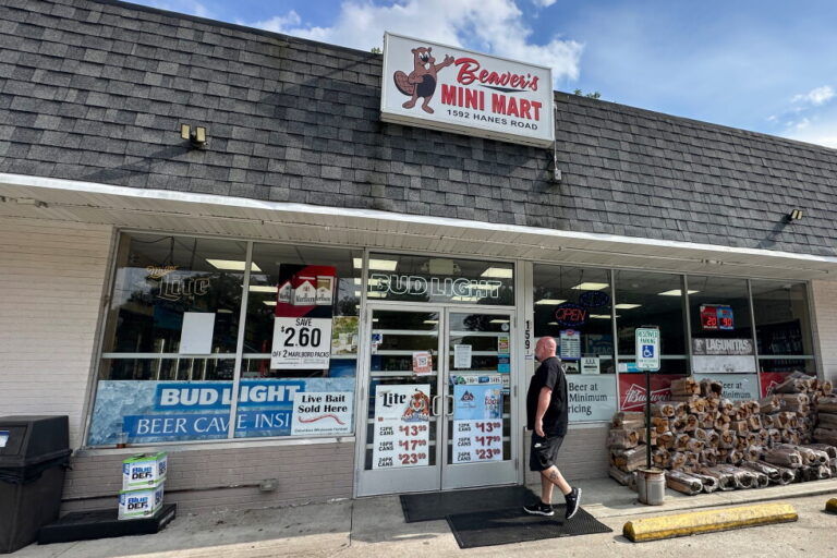 A customer walks into Beaver's Mini Mart in Beavercreek, Ohio, Friday, Aug. 14, 2026. (AP Photo/Julie Carr Smyth)