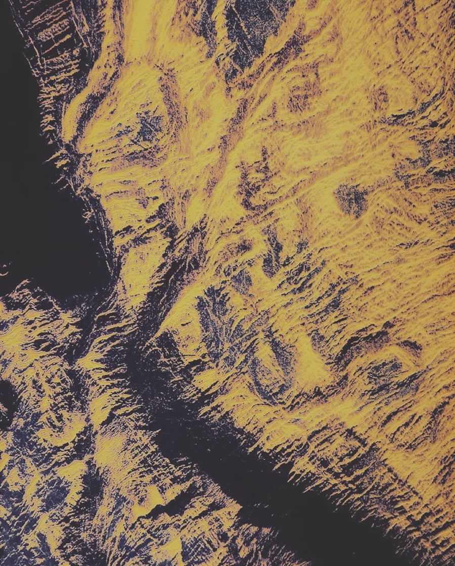 A radar mapped view of Venus's surface from NASA's Magellan mission since thick cloud hides the surface entirely, radar is