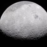 a grey, crater-marked orb on a black background