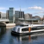 Oslo waterfront with public transport infrastructure in a modern urban setting