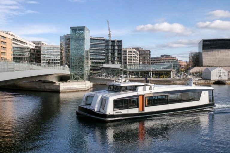 Oslo waterfront with public transport infrastructure in a modern urban setting