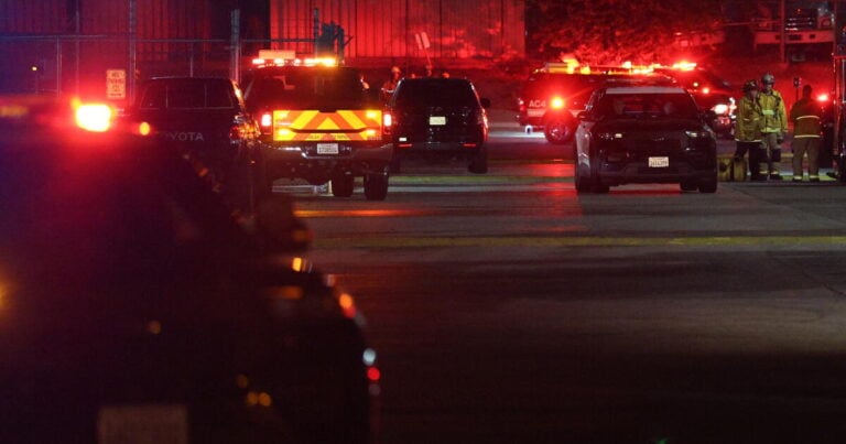 CHATSWORTH, CA - SEPTEMBER 15: Police investigate a helicopter crashed and burst into flames Tuesday night in Chatsworth not