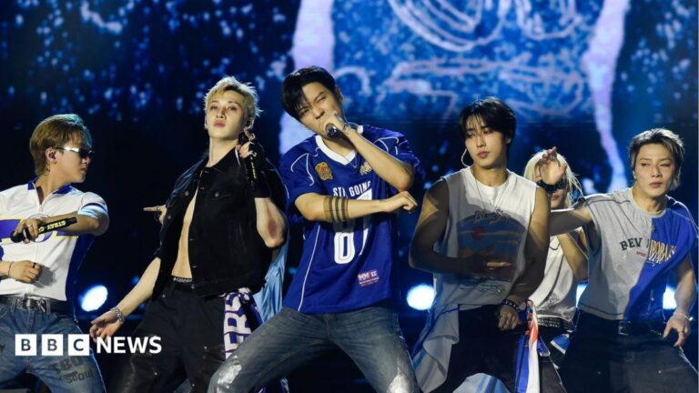 Stray Kids perform on stage in Rio