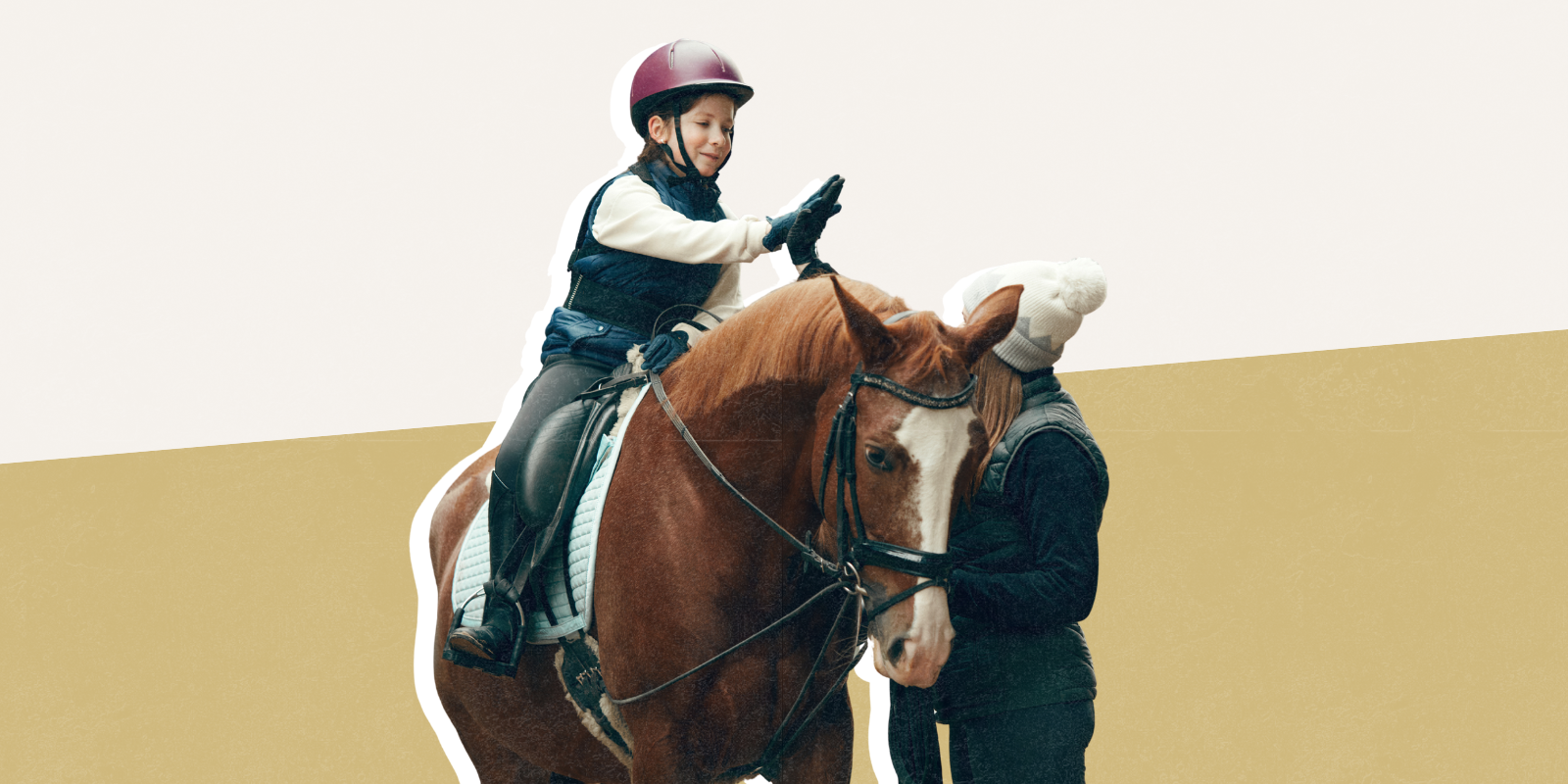 Child on a horse with instructor standing beside