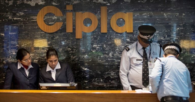 Employees and security staff work at the reception area of Cipla at its headquarters in Mumbai, India June 17, 2015