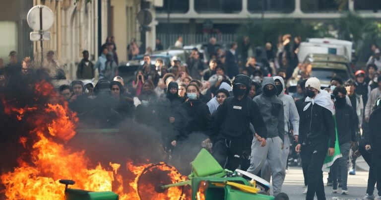 Students protest near Place de la Nation in Paris on Friday. The protests started in the Ile-de-France region around Paris