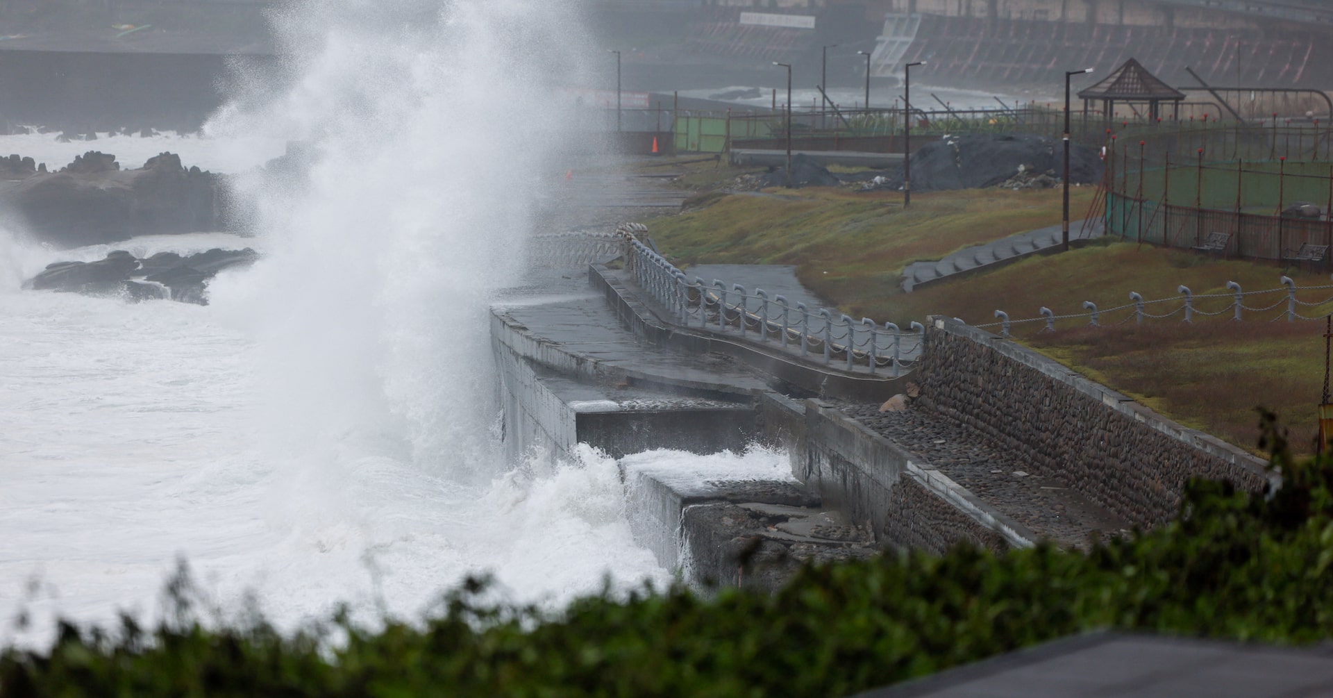 Waves generated by Typhoon Champi crash against a seawall in Keelung, Taiwan, October 23, 2026. REUTERS/Ann Wang