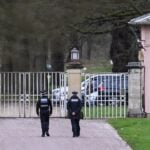 Police officers at the entrance of the Royal Lodge, a property on the estate surrounding Windsor Castle and a former