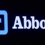 Abbott Laboratories logo is displayed on a screen at the New York Stock Exchange (NYSE) in New York City, U.S., October 18
