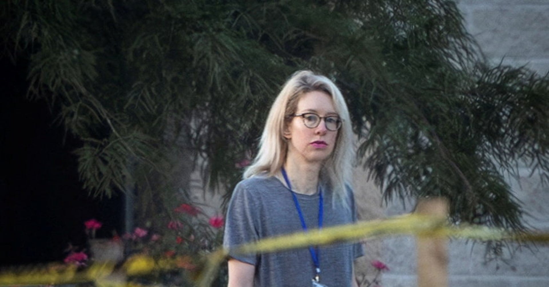 Theranos founder Elizabeth Holmes walks on the grounds of the Federal Prison Camp in Bryan, Texas, U.S., August 3, 2025