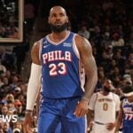 LeBron James #23 of the Philadelphia 76ers looks on during the game against the New York Knicks on October 20, 2026 at