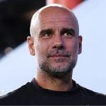 Former Manchester City manager Pep Guardiola wearing a black top